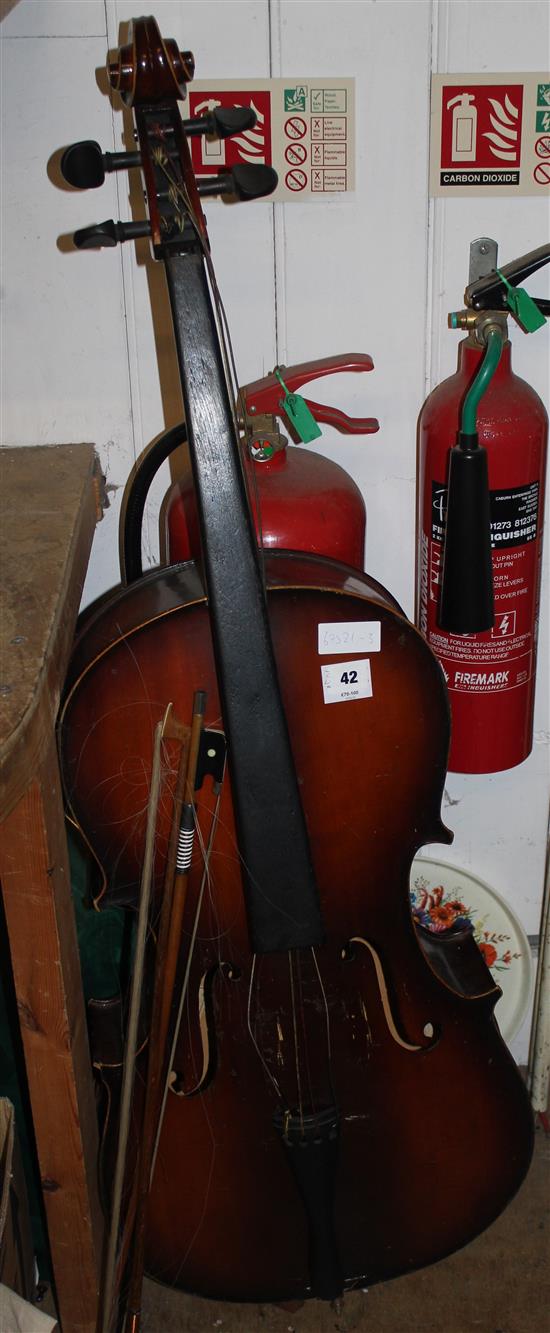 Hungarian cello and two bows(-)